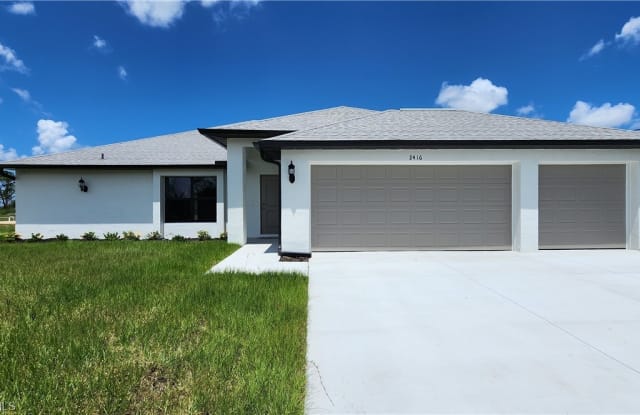 2416 NW 15th Place - 2416 Northwest 15th Place, Cape Coral, FL 33993