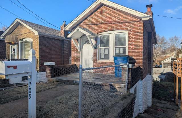 Multiple Levels of Living Space, Two Bath and Large Fenced Yard!
