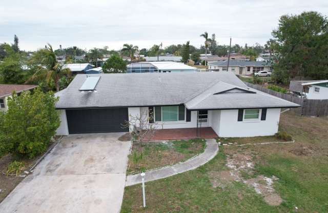 Photo of 3 bedroom - 2 bathroom home with a 2-car garage