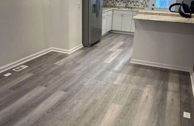 3 Bedroom End Unit with Finished Basement and Fenced Yard on E 28th Street