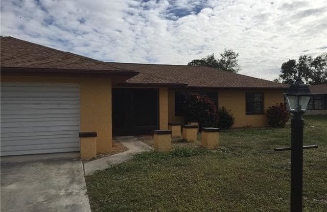 24 Clayton AVE - 24 Clayton Avenue, Lehigh Acres, FL 33936