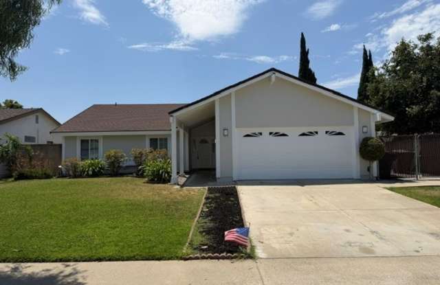On Cul-De-Sac: 4 Bedroom 2 Bath Single Story Home
