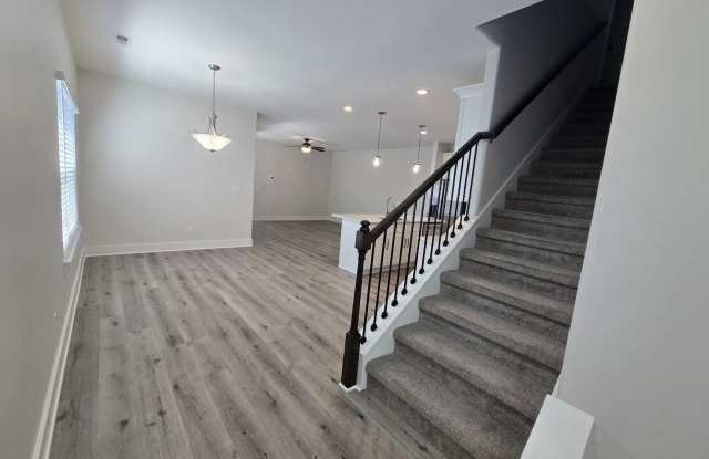 End Unit 3/3.5 Townhome w/ Community Pool!