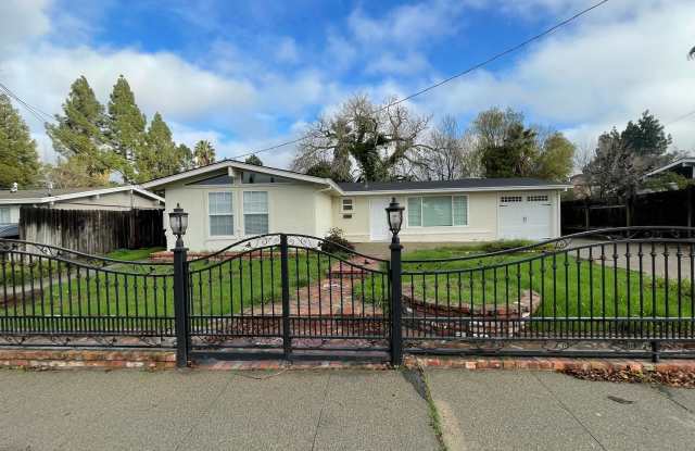 Beautiful 3 bedroom 2 bathroom home, updated kitchen  baths plus 1 car garage!