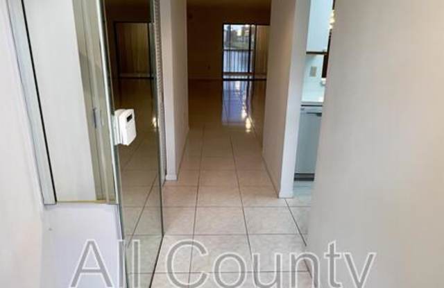 6121 Pointe Regal Circle #209,