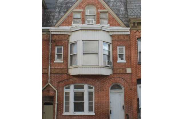 First-Floor Apartment **MOVE-IN SPECIAL: 50% off First Month **