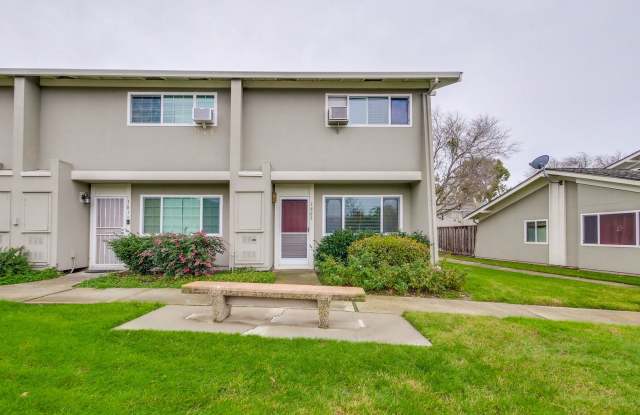 $600 Off The First Month Rent!!! Excellent 2 Bed 1.5 Bath Town home with 2 covered parking spots! - 1803 Strawberry Lane, Milpitas, CA 95035