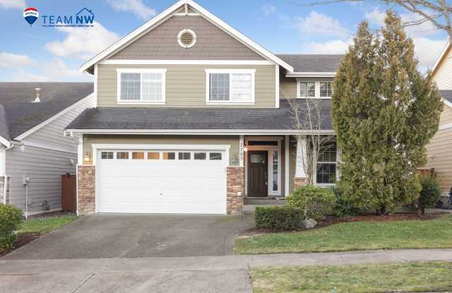 Move in Ready! Glorious 4 bedroom, plus den, plus bonus room!