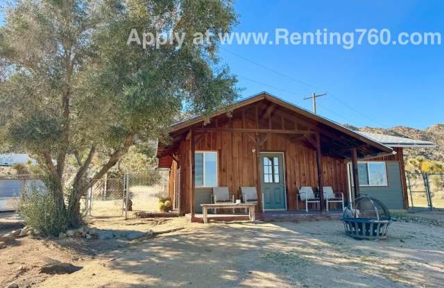 Photo of Cozy Cabin On The Hill