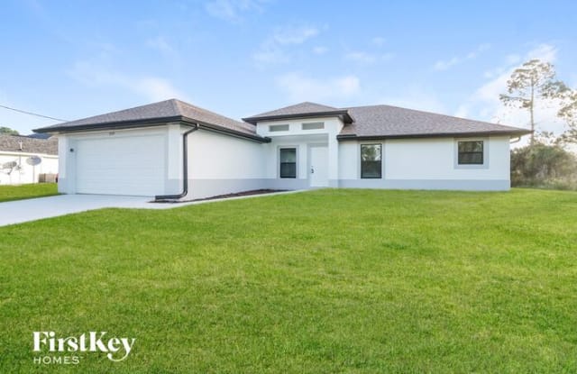 604 Henry Ave - 604 Henry Avenue, Lehigh Acres, FL 33972