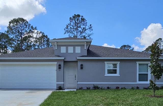 ***$1,500 off 1st month's rent STUNNING 3/2 BRAND NEW HOME IN PALM COAST photos photos