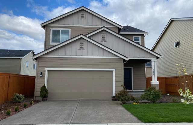 South Creek Meadows 4 BR Home with Den, Gas Fireplace & Attached 2-Car Garage