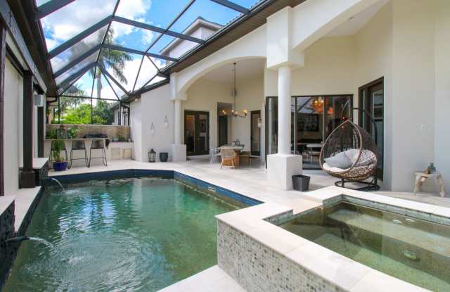 ** LUXURY MODERN ZEN RETREAT IN NAPLES PARK ** WALK TO THE BEACH ** 4BR/4BA PRIVATE POOL  SPA FULLY REMODELED ** MERCATO **OFFERED FURNISHED SEASONALLY, WEEKLY OR ANNUALLY ** NO HOA PROCESS SO MOVE IN TODAY ** READY FOR A TENANT DECEMBER 2025 ** 