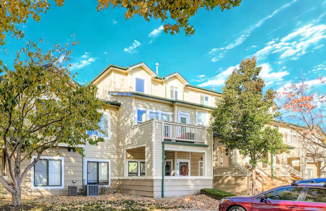 Photo of Light-Filled Corner Condo with Garage + Reserved Parking in Gated Community