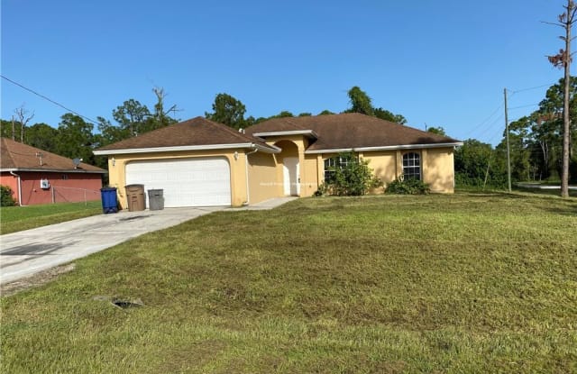 323 Mcarthur BLVD - 323 Mcarthur Boulevard, Lehigh Acres, FL 33974