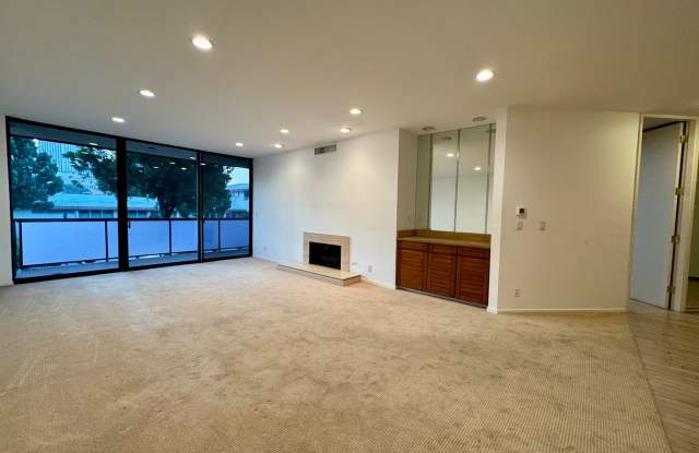 Front-Facing Condo with Natural Light and High Ceilings Throughout