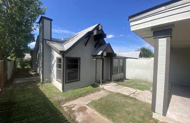 Large 2/2 duplex with a 2 car carport