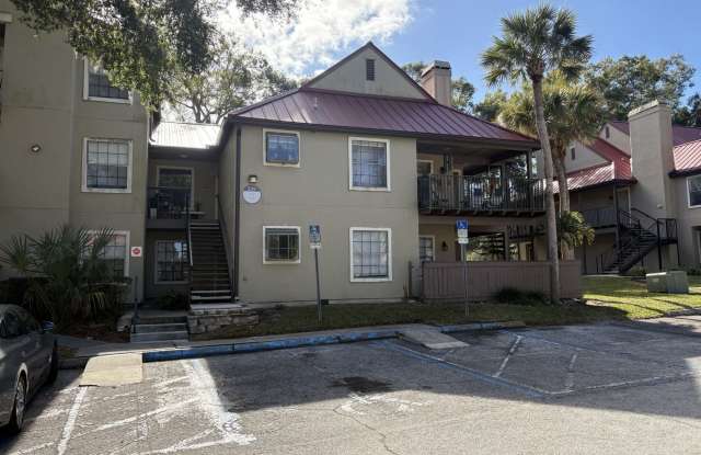 Photo of 1st floor unit with fire place and large patio