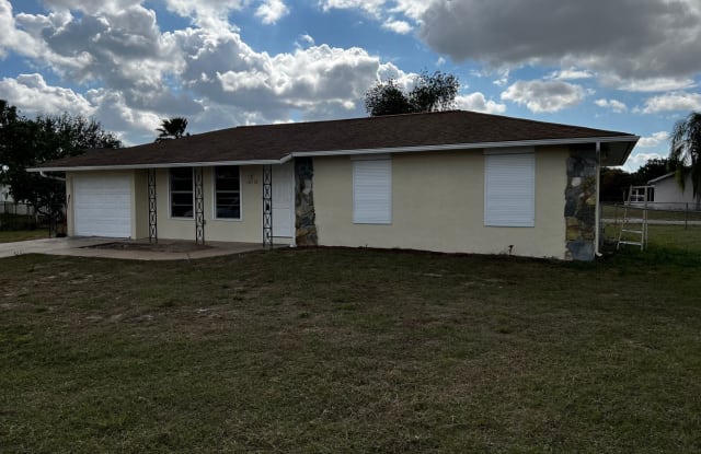 10750 LEMONTREE CT - 10750 Lemontree Court, Lehigh Acres, FL 33936