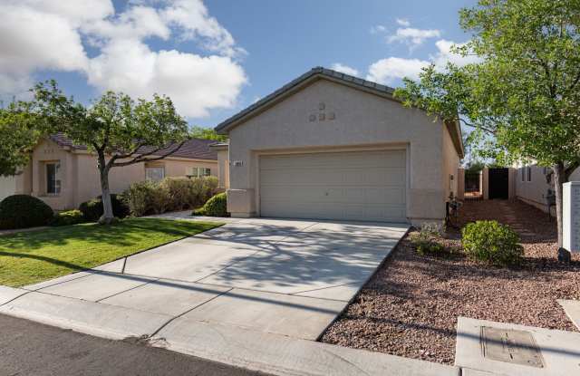 Wonderful Summerlin single story with grass backyard and island kitchen.