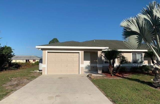 1504 Gilbert AVE S - 1504 Gilbert Ave S, Lehigh Acres, FL 33973