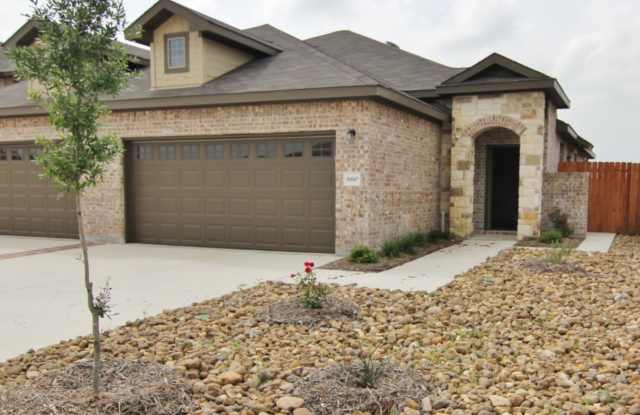 Fridge Included / Interior Washer/Dryer Connections/ Fenced in Back Yard / CISD