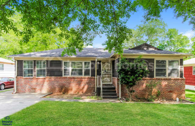 Updated Bungalow with Massive Deck and Fully Fenced Yard!