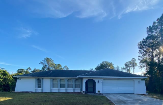 218 Roosevelt Ave - 218 Roosevelt Avenue, Lehigh Acres, FL 33936