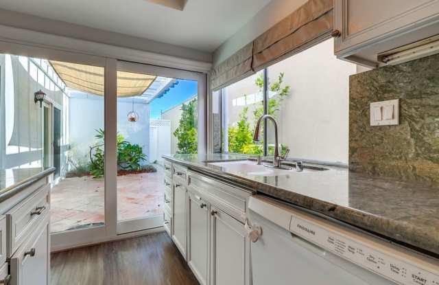 OUTSTANDING 4 BEDROOM HOME IN GATED COMMUNITY