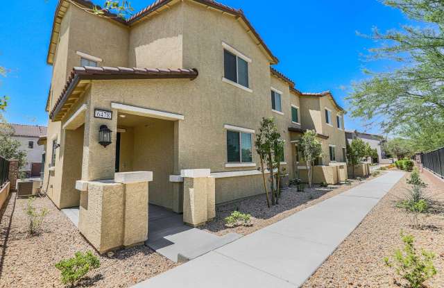 Modern Gated Townhome with Spacious Open Layout & Designer Kitchen!