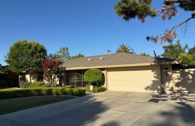 Stockdale Country Club 3 Bedroom Home with Paid Solar, Sunroom, RV Parking, and Ample Storage