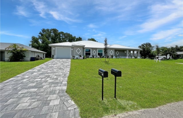 745 Harry Avenue S - 745 Harry Avenue South, Lehigh Acres, FL 33973