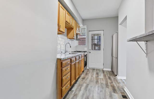 Photo of Spacious 3-Bedroom/1-Bathroom home with Modern Amenities in East Baltimore!