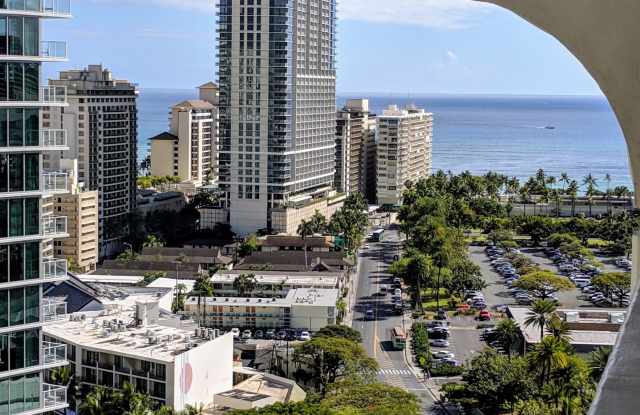 Sweeping Views from this partially furnished 1 Bed 1 Bath Condo w/ 1 Covered Parking