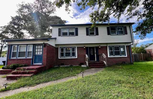 Colonial home in the desirable Hunters Point neighborhood