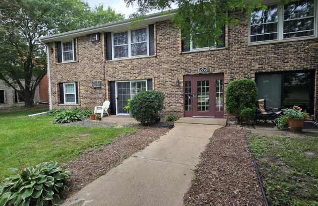 Move-in special! Reduced security deposit. Hopkins condo with in-unit laundry and lots of community amenities