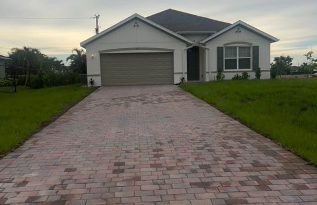 617 NW 17th Place - 617 Northwest 17th Place, Cape Coral, FL 33993