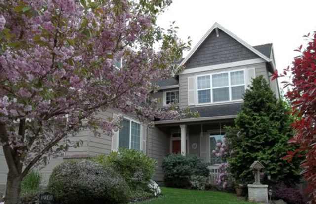 12540 NW Brimpton Court ~ Elegant Bethany Home with NEW Carpet & Fresh Paint