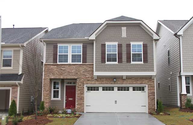 Low Maintenance Detached Home in Central Triangle Location!