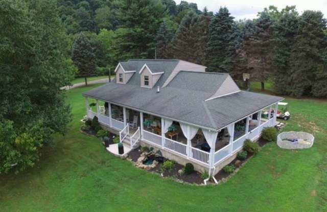4 Bedroom 2 1/2 Bath Home w/ Wrap Around Porch