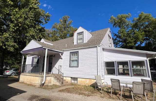 Steps from Kansas State University! Spacious 4-Bedroom Duplex