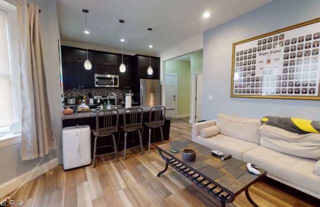 Photo of Renovated, luxurious 4bed/2 bath unit with laundry in unit and spacious rooms!