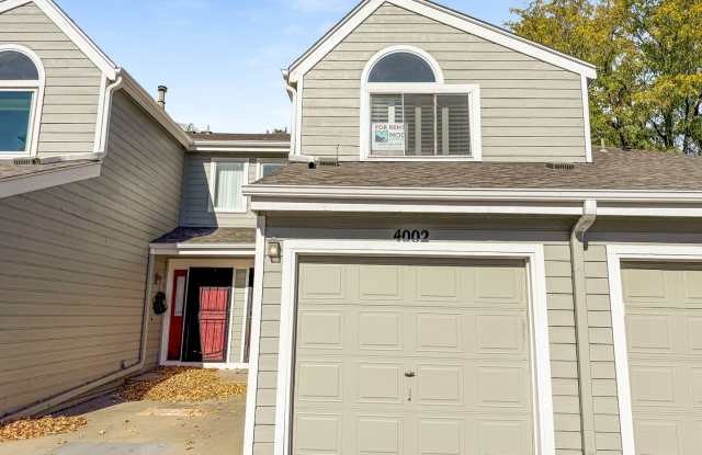 $0 DEPOSIT OPTION. CHARMING TWO-STORY TOWNHOUSE WITH FINISHED BASEMENT, GARAGE, AND HOA AMENITIES IN INDIAN CREEK