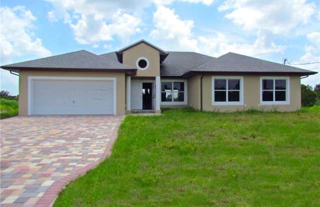 419 Mercedes CT - 419 Mercedes Court, Lehigh Acres, FL 33972