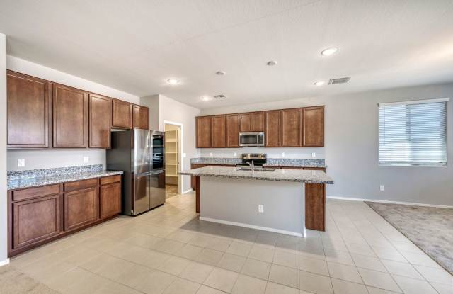 Photo of Like new single level 4 Bedroom, 2.5 Bathroom in gated community!!! Huge Kitchen, large lot!! Across from community Trail!! Close to Westgate District!!!