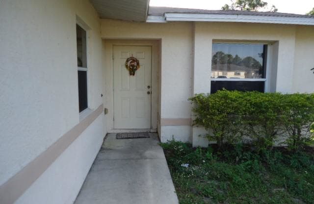 774 Eisenhower BLVD - 774 Eisenhower Blvd, Lehigh Acres, FL 33974