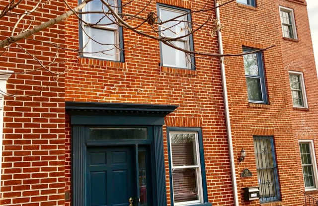 Stylish 3 Bedroom Townhome w/ Top Floor Deck in Ridgley's Delight!
