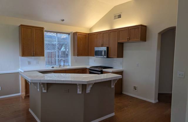 Wonderful 4 bedroom home in Clovis offering a pool, spa, 3 car garage, potential RV and or boat space, a wonderful floor plan and nice amenities.