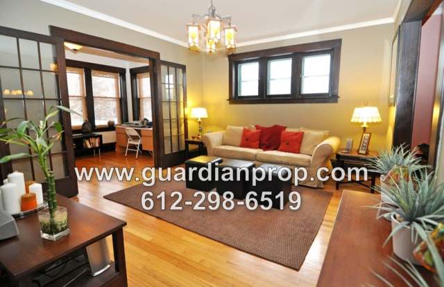 Merriam Park Condo Available September 1st, Main Floor Corner Unit, Hardwood Floors, Sunroom, Parking, In Unit Laundry