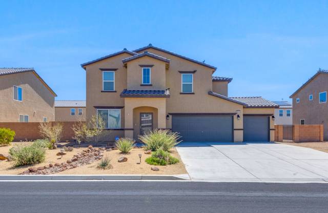 Nestled on a large lot, this two-story single-family home offers the perfect blend of comfort and style. photos photos